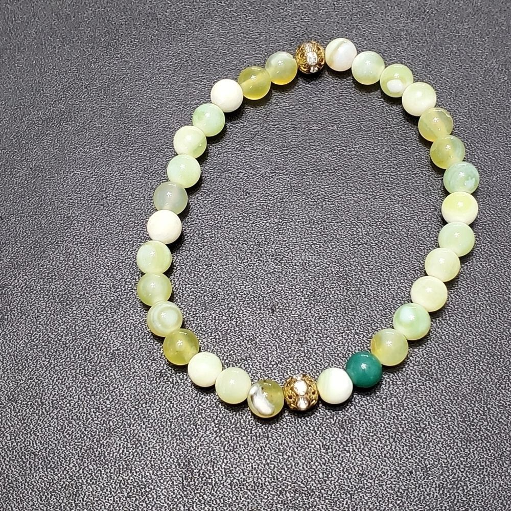 Green, yellow and white stone bead bracelet 7.25"